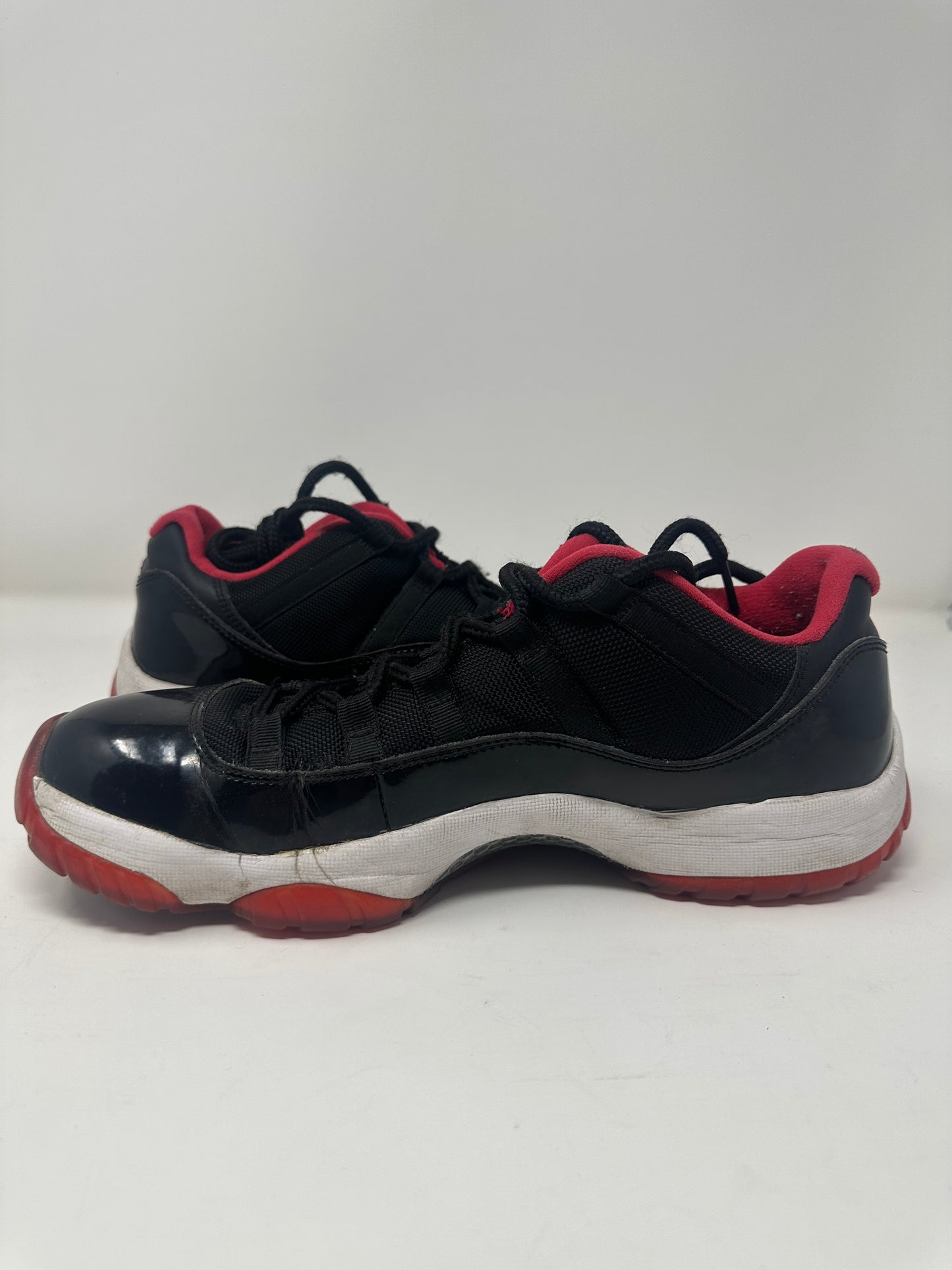 Jordan 11 Low “Bred”