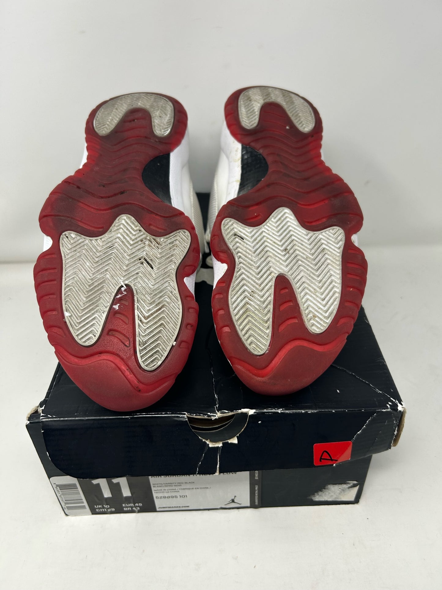 Jordan 11 Low “Cherry”