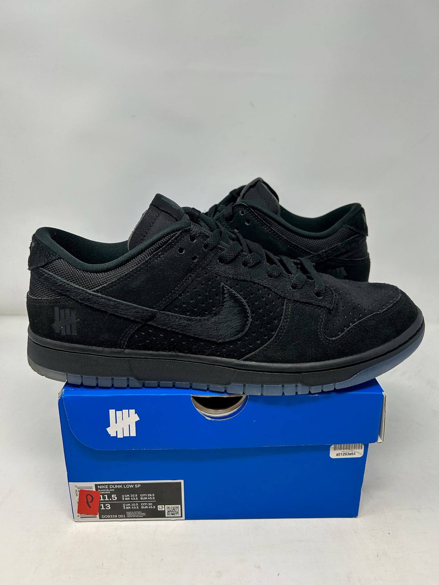 Nike Dunk Low Undefeated “Black”