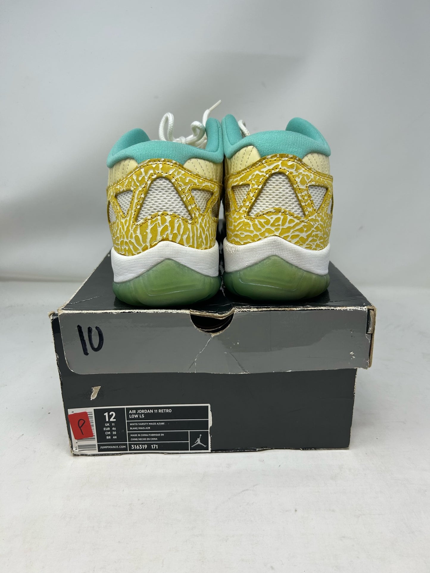 Jordan 11 Low IE “Azure”