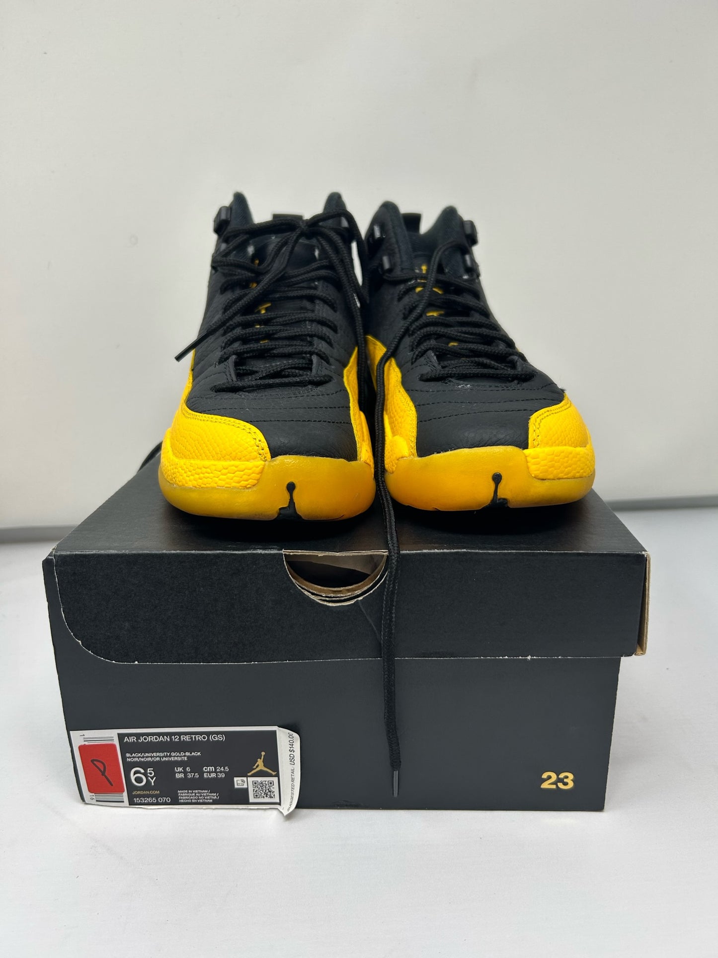 Jordan 12 GS “University Gold”