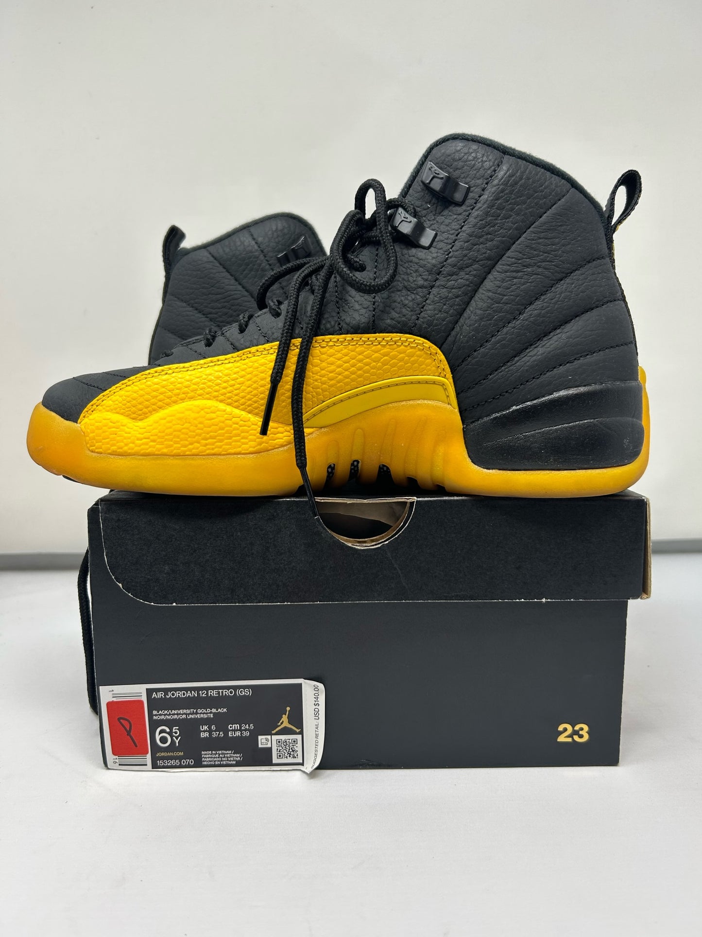 Jordan 12 GS “University Gold”