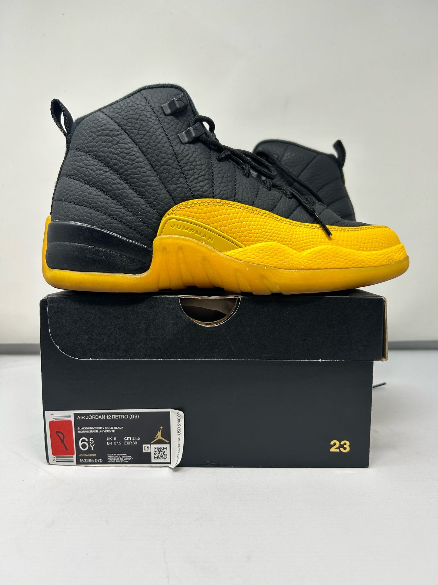 Jordan 12 GS “University Gold”